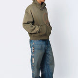 SNAKESKIN EMBELLISHED JEANS