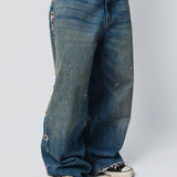 SNAKESKIN EMBELLISHED JEANS